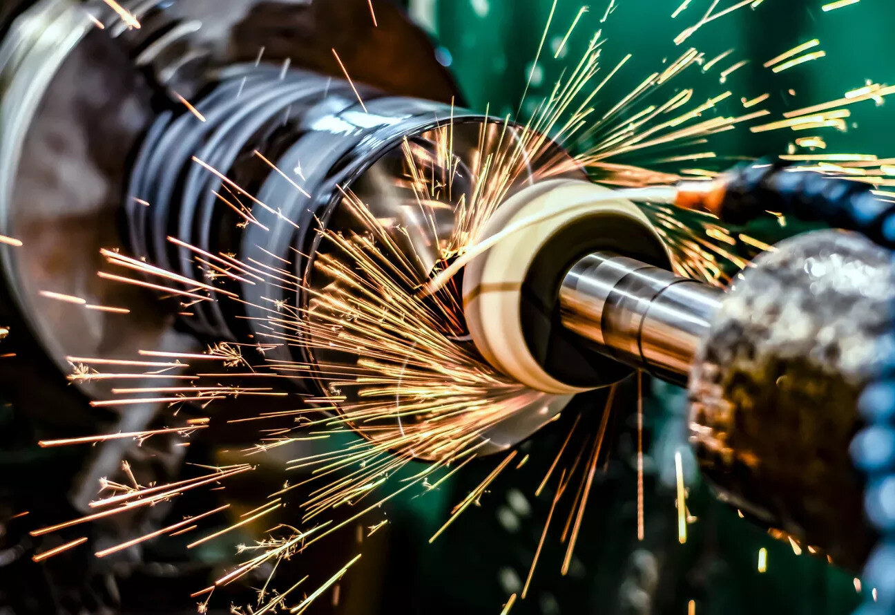 High-performance CNC deburring machine with an automated control panel in an industrial setting. The enclosed system ensures precision deburring, improved surface finish, and enhanced safety for metal fabrication and manufacturing processes.